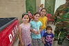 Aline und ihre drei jüngeren Schwestern sind froh, dass sie nach Baqofa zurückkehren konnten (csi)